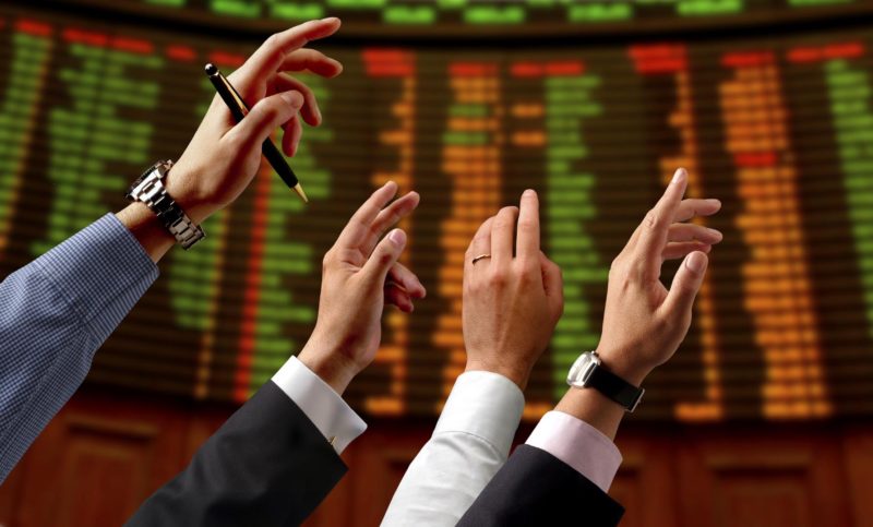 hands on a stock market